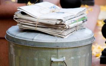 newspaper garbage_can